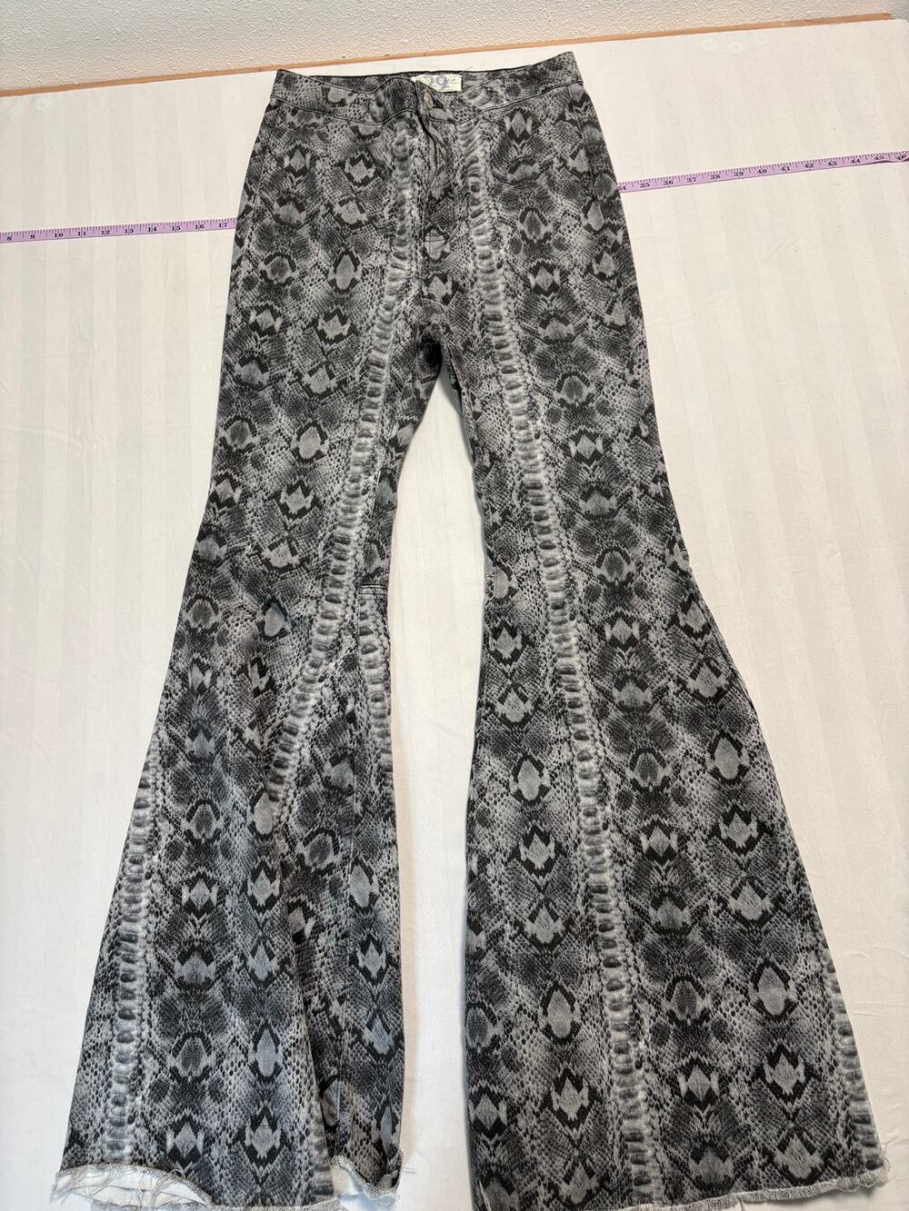 We The Free Snake Print Flare Jeans